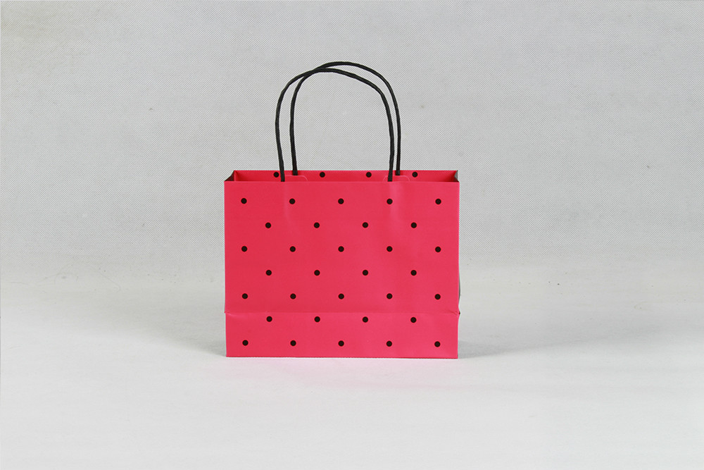 玫紅黑點(diǎn)時(shí)尚銅版禮品紙袋定制