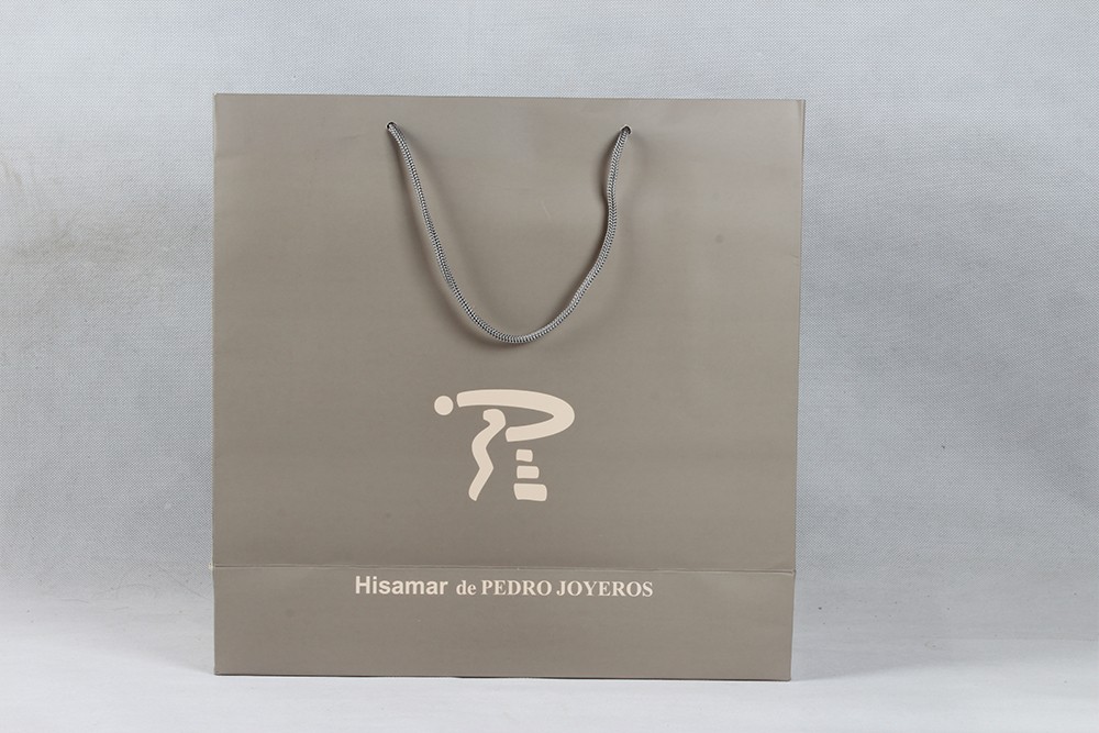 大寫(xiě)R個(gè)性白卡紙袋