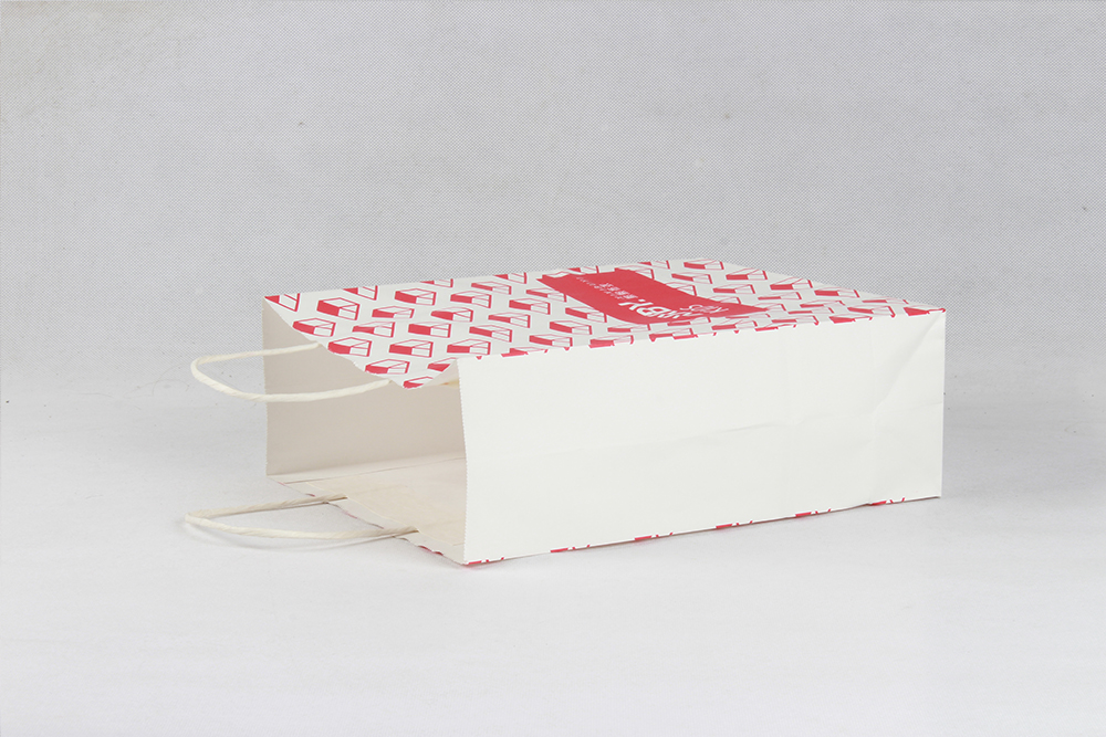 熙熙布衣時(shí)尚服裝牛皮紙袋 熙熙布衣時(shí)尚服裝牛皮紙袋