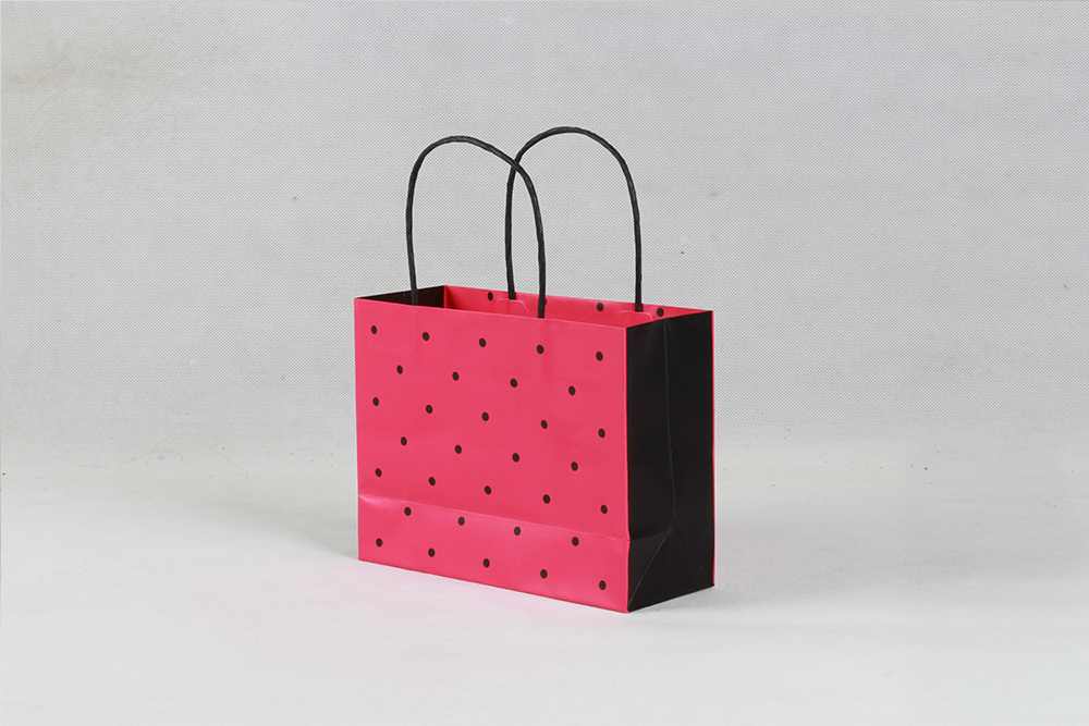 時(shí)尚紅底黑點(diǎn)禮品銅版紙袋